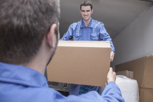 Furniture collection team handling a sofa pick-up in Arkley