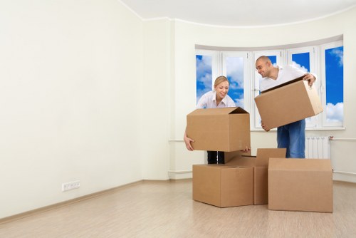 Business furniture and boxes ready for transport in Arkley