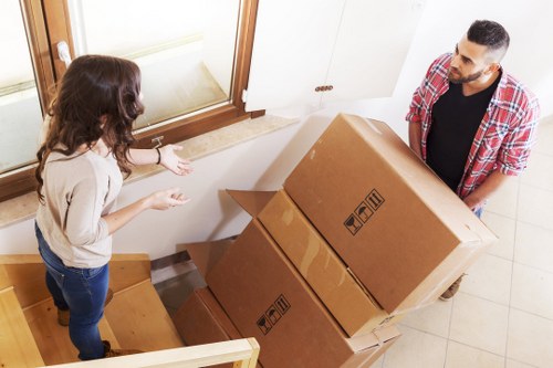 Local movers handling furniture in a residential move in Arkley