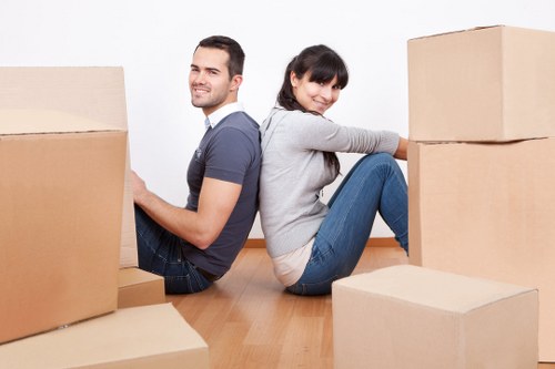 Moving team handling furniture during a van transport service