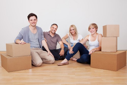 Removal team loading boxes and furniture for an Arkley home move